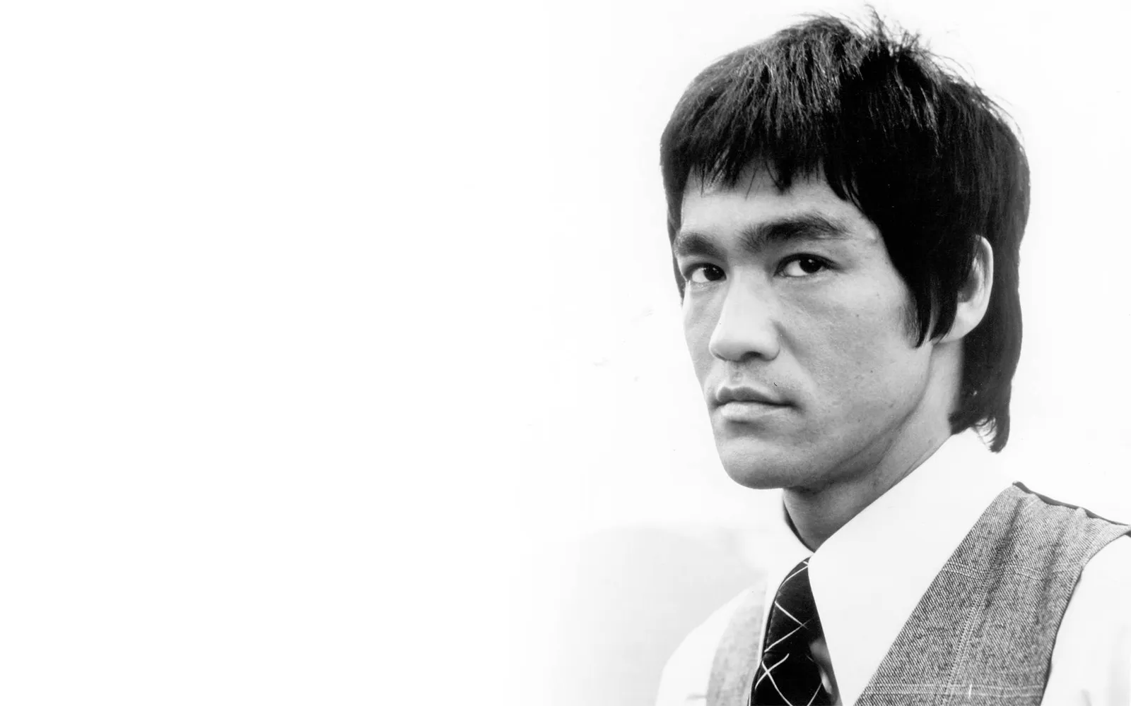 Bruce Lee against a white background.